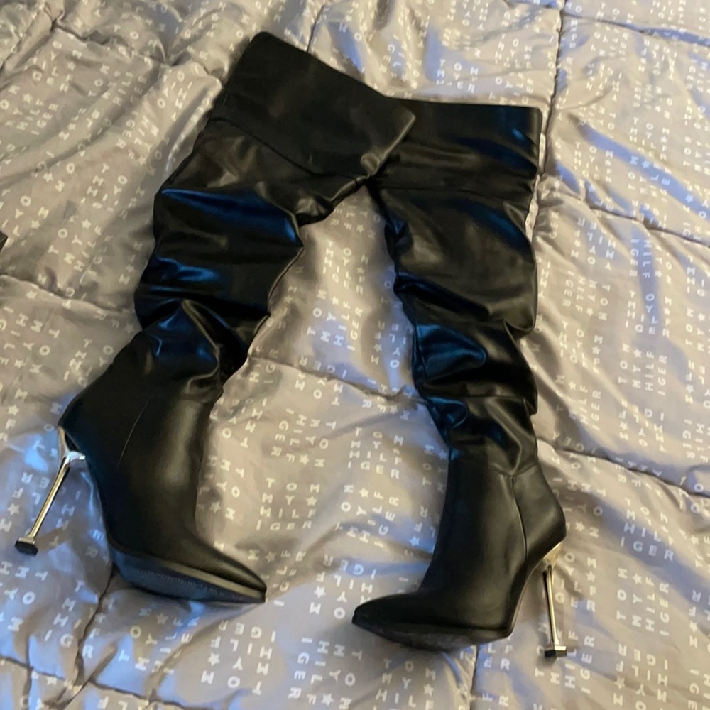 1 pair of black over the knee with heel boots